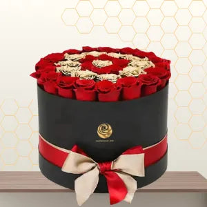 red and golden roses black flowers box.webp