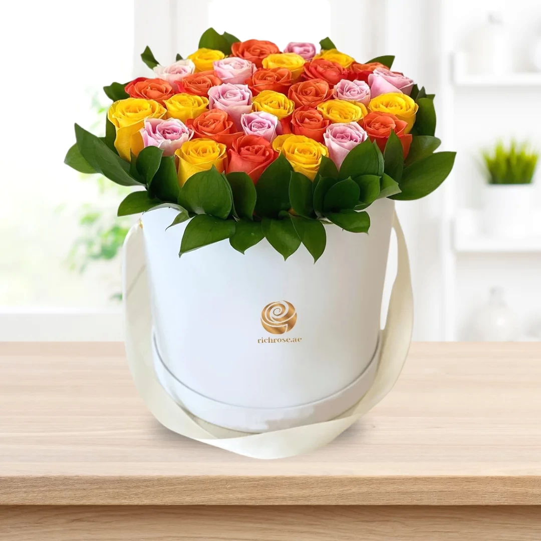 Yellow, Orange, and Pink Roses in White Box