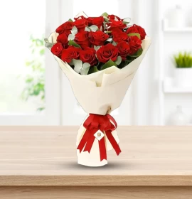 red roses in white wrapping - flower delivery