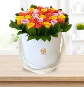 Yellow, Orange, and Pink Roses in White Box