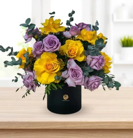 Purple and Yellow Roses in Black Box