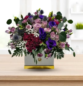 Mixed Purple Flowers in White Square Box