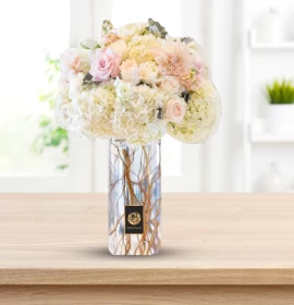 white flowers in tall vase - premium flowers